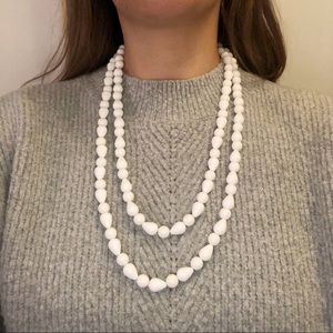 Vintage. Long white beaded necklace.